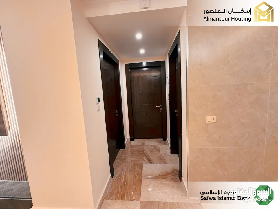 شقة ارضي معلق يمين 85م2 فاخرة للبيع في خلدا/ مشروع مكة مول 5 (2/2) ( إسكان المنصور )