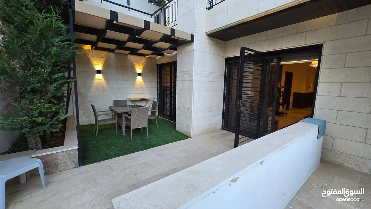 شقة ارضيه فاخرة للايجار في #عبدون مع حديقة // ديكورات فخمة (لم تسكن)