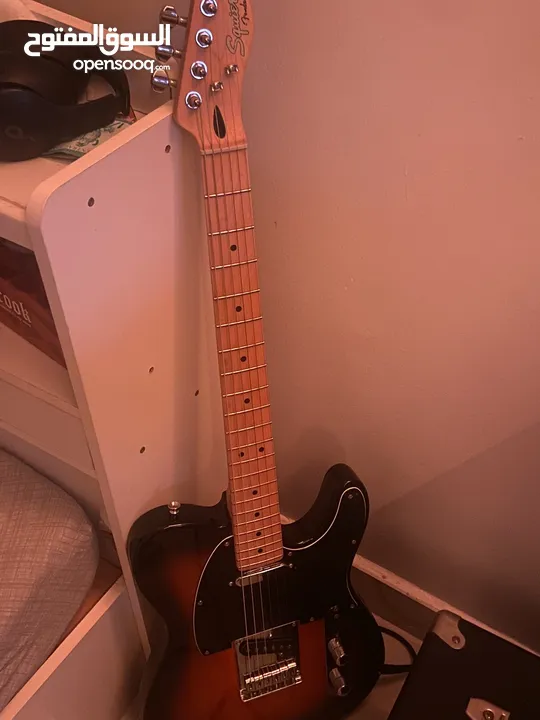 Electric guitar to swap with black guitar