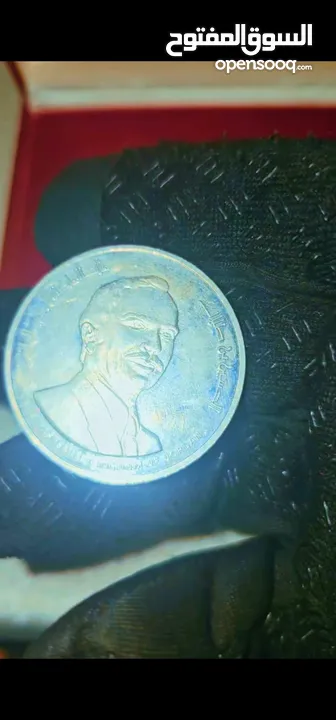 عملة فضة بوزن اونصه