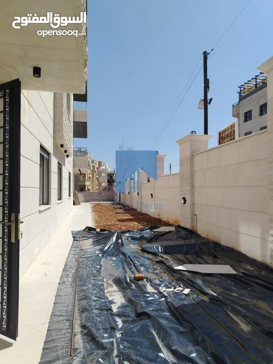 شقة أرضية فاخرة للبيع في خلدا  - خلف المستشفى السعودي 330م مع حديقة وترسات 100م لم تسكن