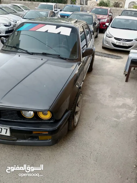 BMW 318i بوز نمر موديل 1989 للبيع بدفعه أولى 950 والباقي اقساط شهريه من المالك مباشره كمبيلات وتناز