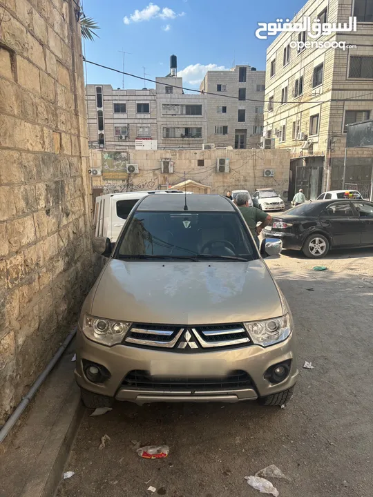 تندر متسبيشي L200 دفع خلفي 4x2 الحالة نظيف و السعر قابل لتفاوض مطور قير نظاف نظاف