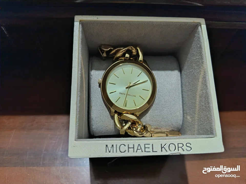 ساعة مايكل كورس أصلية مع العلبة