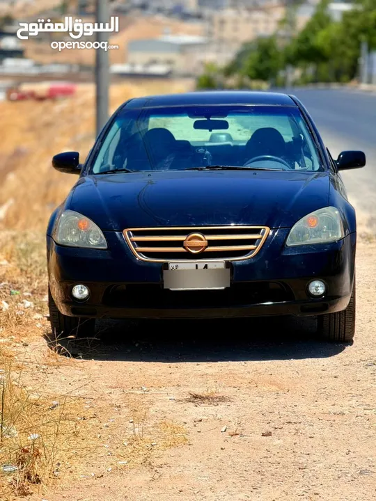 نيسان التما بنزين ماتور 2500 لون اسود