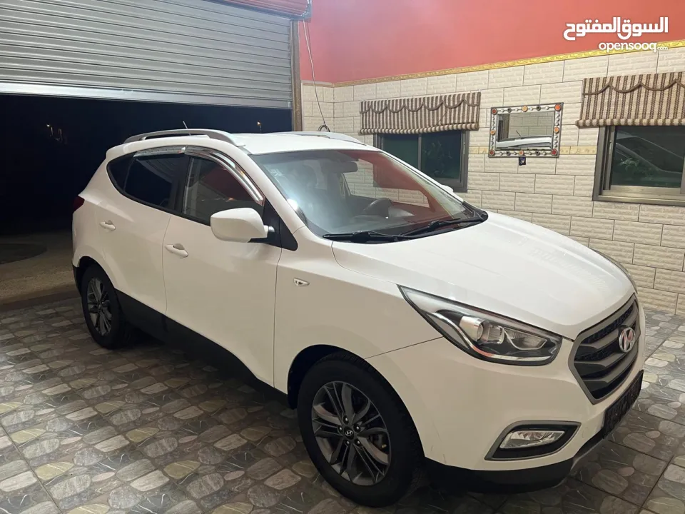 جيب توسان 2014 بوية شركة ولا غرام دهان حبة مميزة بكل تفاصيلها ايد 1 عداد حقيقي ب النايلون فعلي