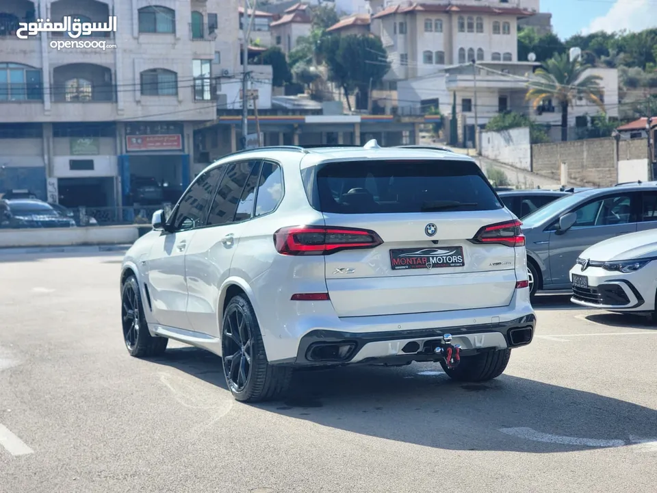 BMW X5 45e ترخيص 2022 ترخيص محرك 3000 هايبرد plug in/يقطع على الشحنه 100 كيلو متر 399 حصان