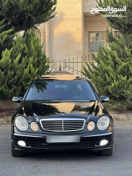 مرسيدس e200 موديل 2006 بحالة الوكالة فل اضافات افنتجارد لون اسود بالصلاة ع النبي ما شاء الله