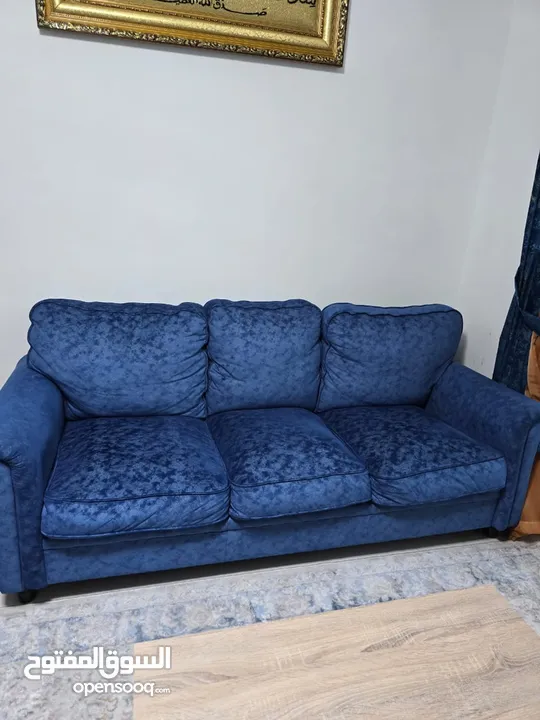 beautiful blue velvet sofa available for very affordable price