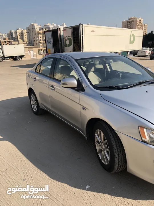 لانسر 2016 رمادي بحالة ممتازة سيرفس وكالة lancer ex 2016 2000cc