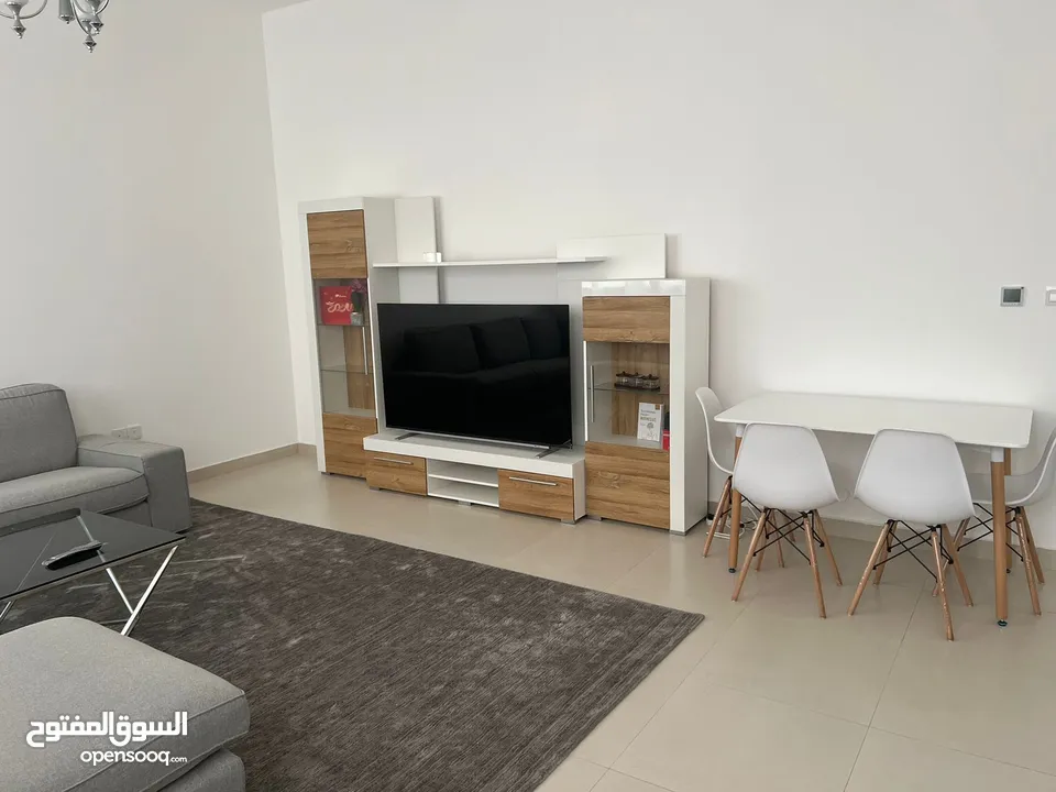 Al ameera village ready to move garden view apartment with furniture