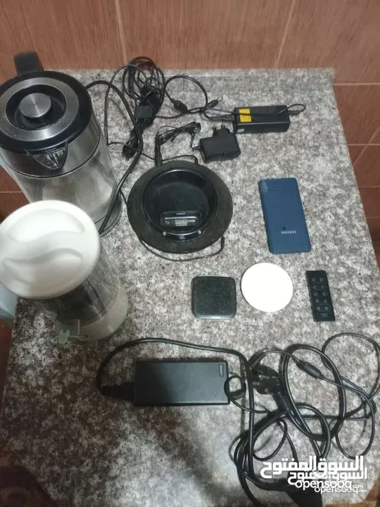 سماعه ايفون + ايبوت+ محولين اصليات لا لا بتوب وفي الو عددة رؤس بشبك ع اي جهاز وعصارت برتقال وليمون