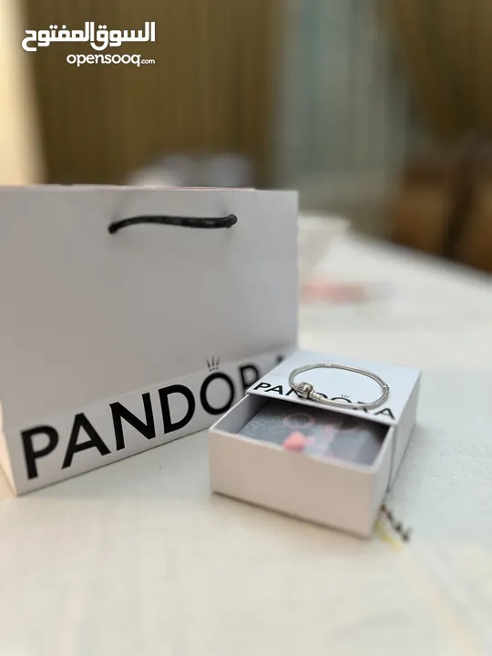 إسواره pandora أصليه مستعمله بس بحال جديده للبيع مع الكيس ولعلبه تعونها