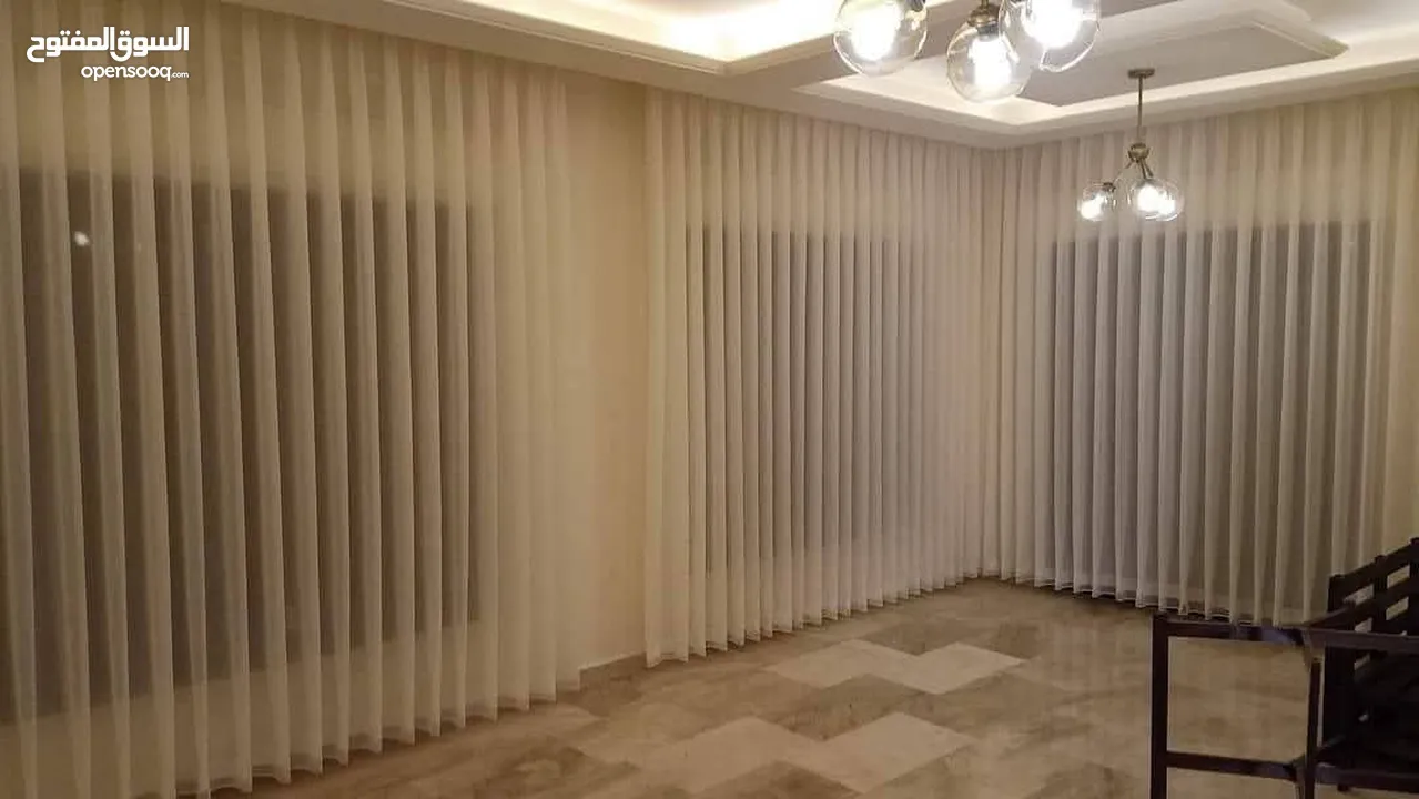 مشغل التقنيه للستائر