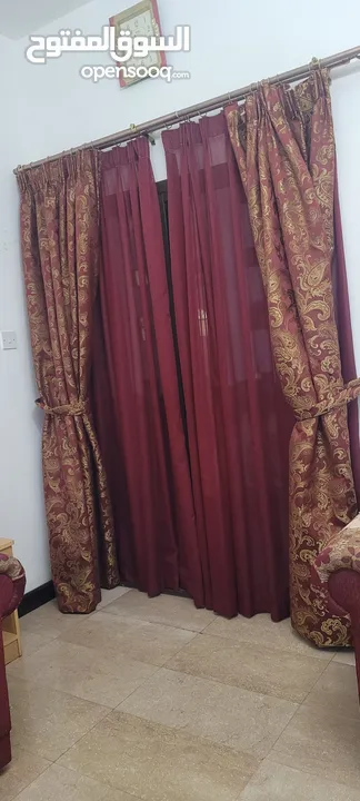 Beautiful Curtains ,  Cloths behind with the Rod
