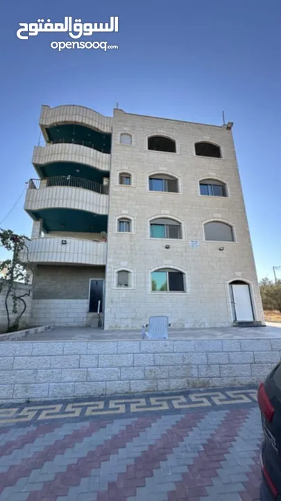 ارض دونم مع عمارة اربع طوابق للبيع