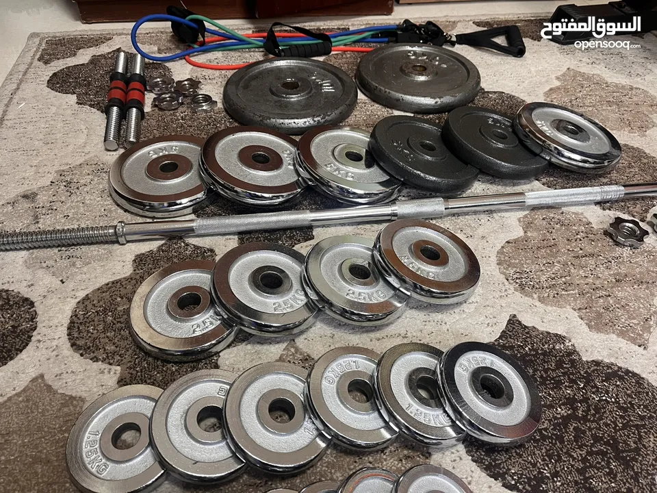 80 كيلو + بنش + بار+2دامبل + حبلين مقاومه