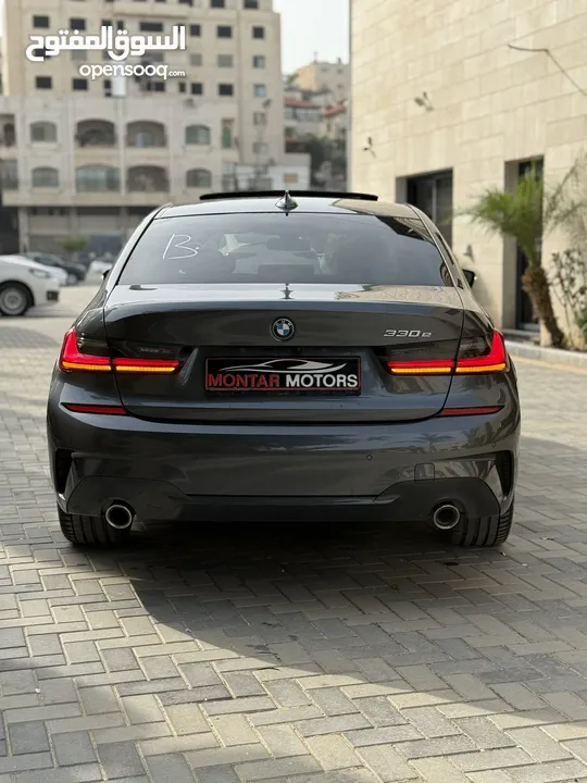 ترخيص 2022 BMW  330e  محرك 2000 هايبرد plug in/يقطع على الشحنه 50 كيلو متر  297 حصان