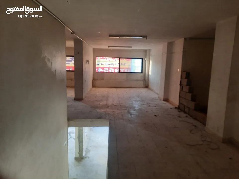 محلات تجارية مؤجرة عدد 4 للبيع تمليك في مرج الحمام على الشارع الرئيسي بمساحة اجمالية 342م