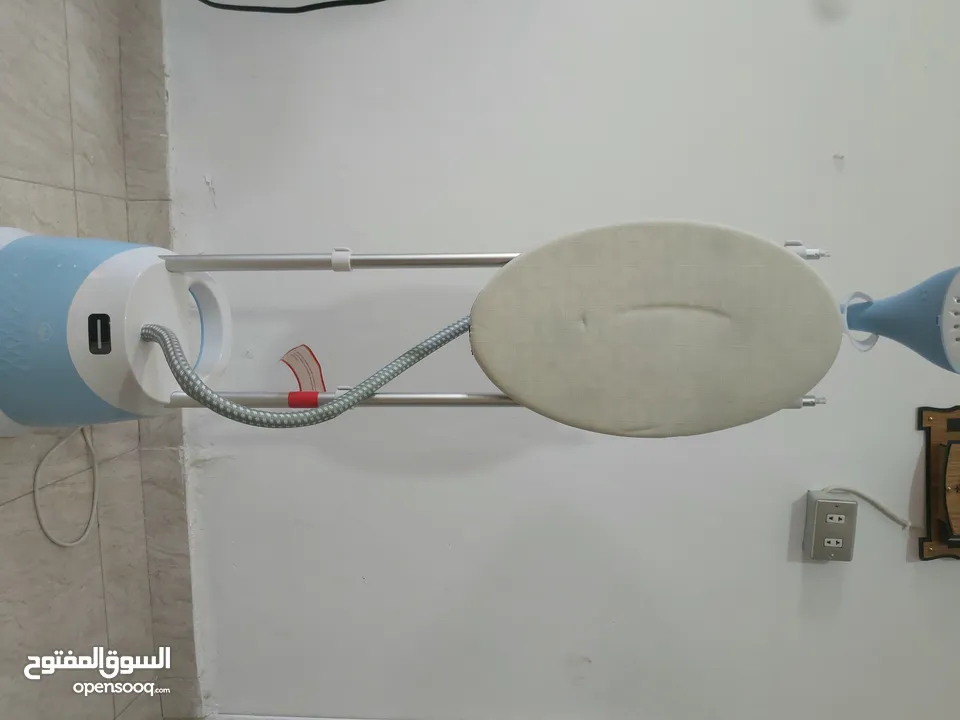 مكواة بخارية عامودية