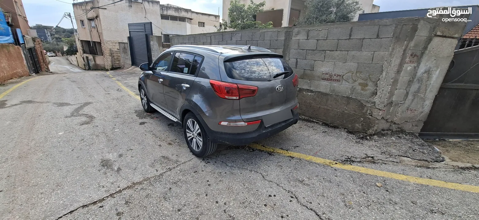 جيب كاياسبورتاج موديل 2014-اتومتيك'دفع 4×4 ماتور 2000ديزل فل فل اضافات ماعد الفتحة - نظيف من الاخر