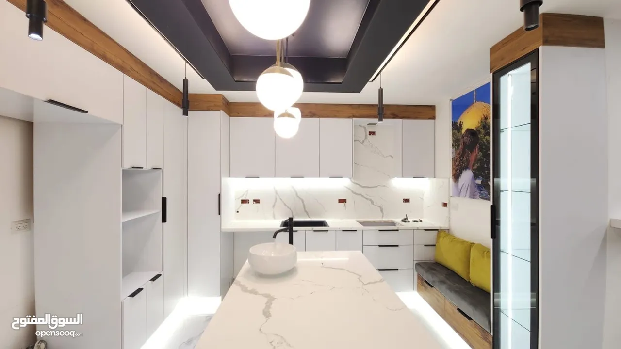 دفعة 1000 شيكل والباقي شيكات وفصل المطبخ الي بناسبك