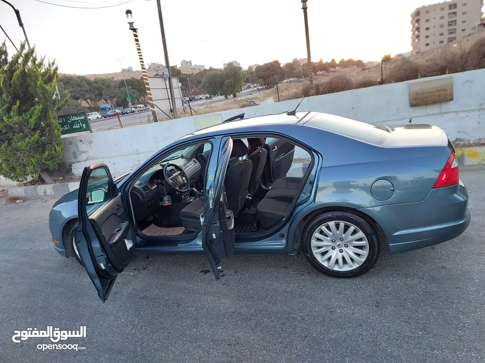 فورد فيوجن 2011 هايبرد استخدام شخصي كلين تايتل 4 جيد  ماتور وجير ونظام الهايبرد بدون اي مشاكل لون بت