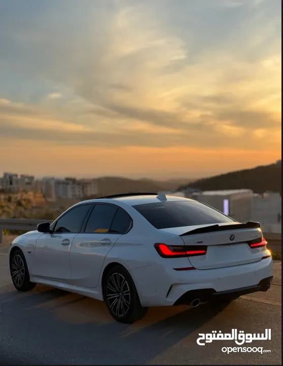 BMW 330e M package 2021 XDrive plagein haypred  4*4