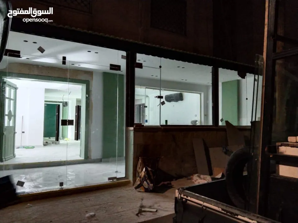 تفصيل تنفيذ وصيانة ابواب واجهات السيكوريت بافضل جوده ووقت وسعر