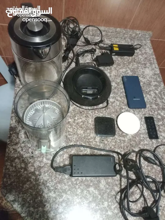 سماعه ايفون + ايبوت+ محولين اصليات لا لا بتوب وفي الو عددة رؤس بشبك ع اي جهاز وعصارت برتقال وليمون
