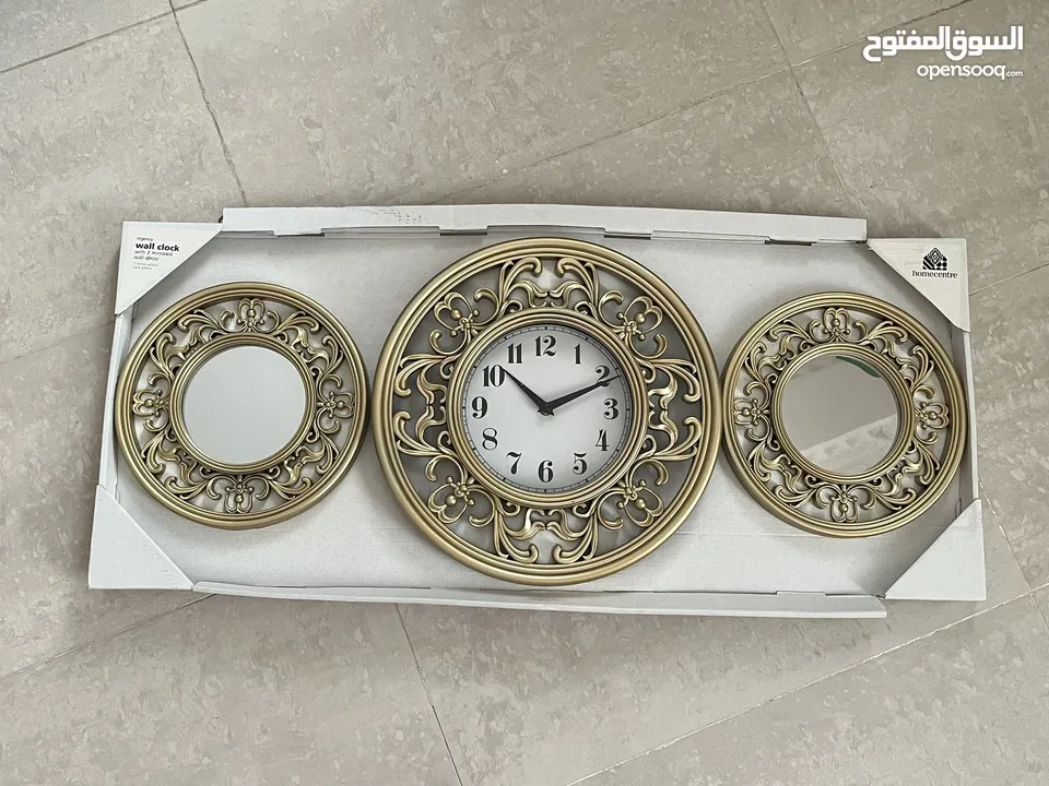 Brand new wall clock and mirrors