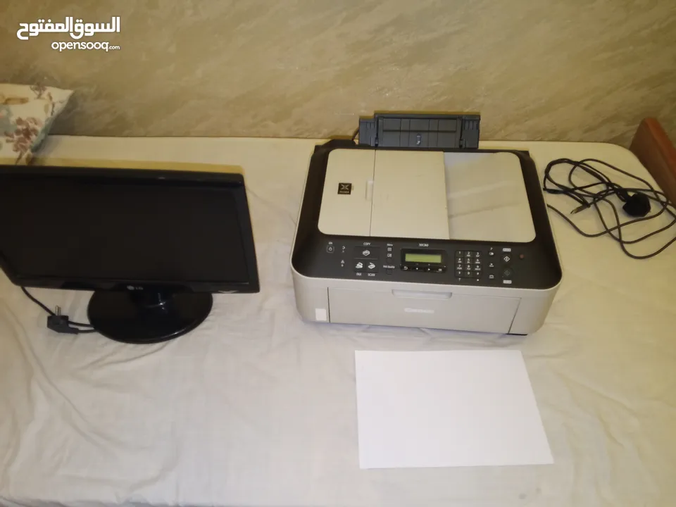 طابعة كانون مع شاشة lg للكمبيوتر طابعة متعددة الاستخدام وشاشة للكمبيوتر جيدة وقوية ومناسبة للالعاب.