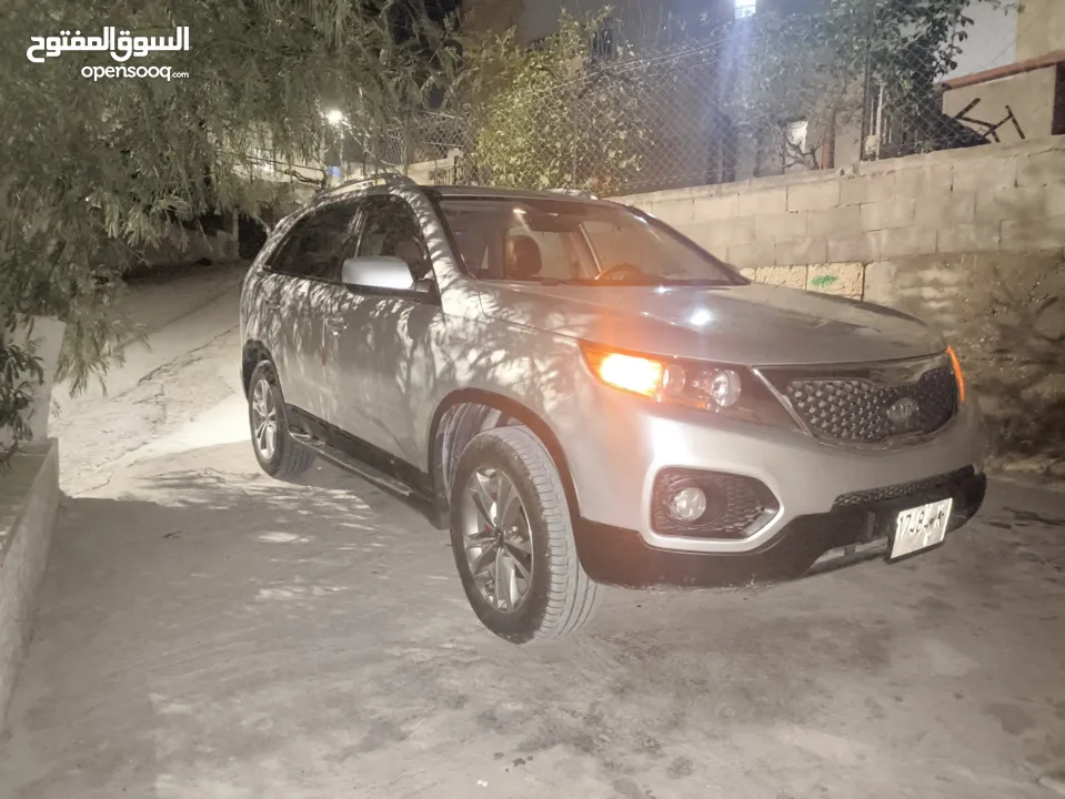 كيا سيرنتو4×4ديزل متور2200 فول اضافات فتحه بانوراما هوك مسجل بترخيص