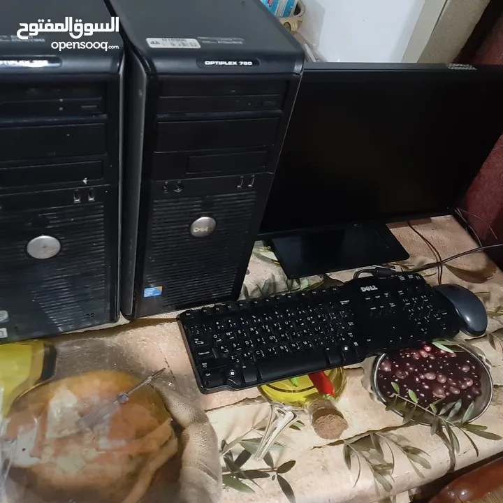 Two Dell PC ,with 3 Keyboards and 3 Mouse and 1 Dell Moniter