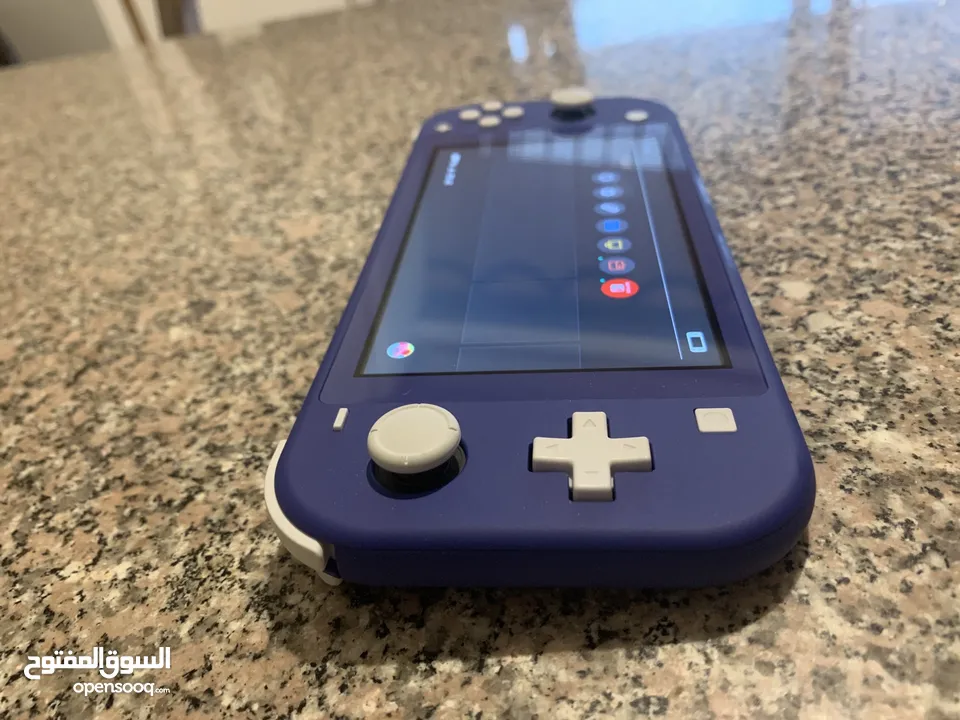 Nintendo switch lite for sale great condition, almost brand new, barely used, no cracks