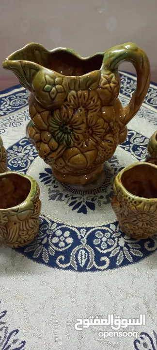 طقم ابريق و6 كاسات فخار انتيك