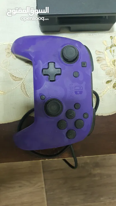 NINTENDO SWITCH WITH CONTROLLER  negotiable