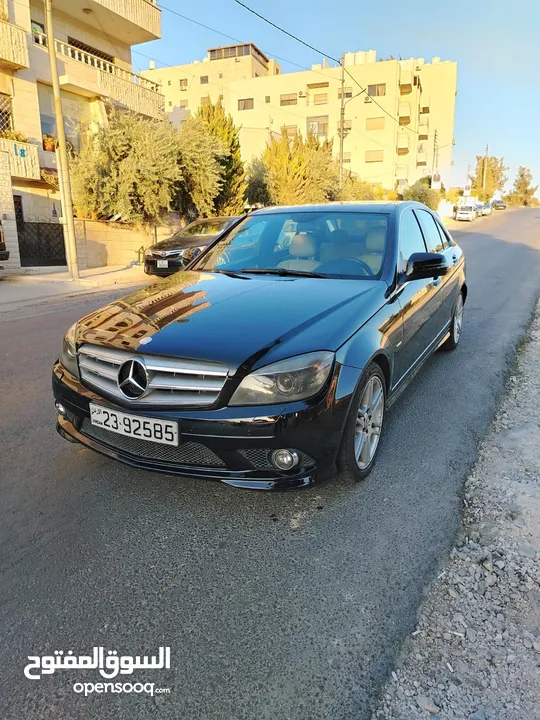 مرسيدس C200 2009 لون اسود اعلى صنف AMG kit فحص كامل للبيع