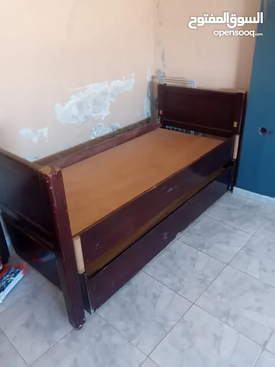 bed with trundle for sale  تختين مفرد للبيع