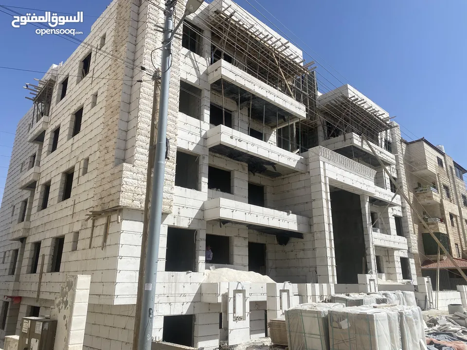 شقق 121 متر شركة درة المباني طابق اول  للبيع في البنيات قرب مدارس الحصاد