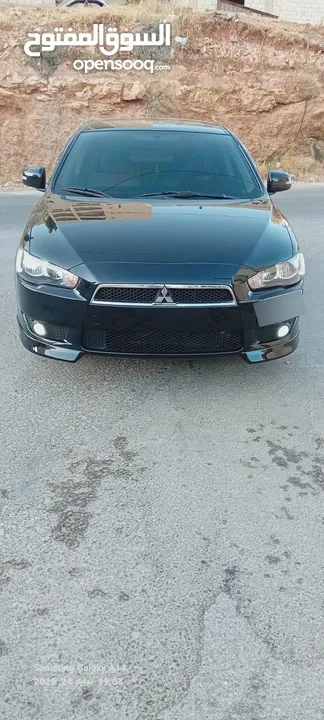 متسوبيشي لانسر فراشة موديل 2015 فحص مرفق مع الصور بحالة الوكاااااالة  ماشية 49 الف km  أصلي