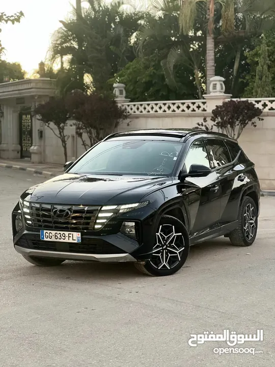 توسان هايبرد ( hybrid plug-in N-Line ) اوتوماتيك فل مواصفات بانوراما 4*4 بمشي 65 ك عالشحنه