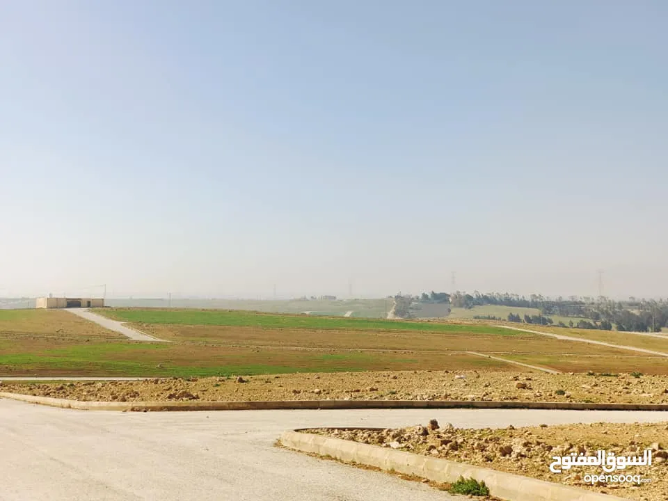 ارض  للبيع طريق المطار القسطل مساحه 400م ضمن مشروع بوابة عمان استثماريه