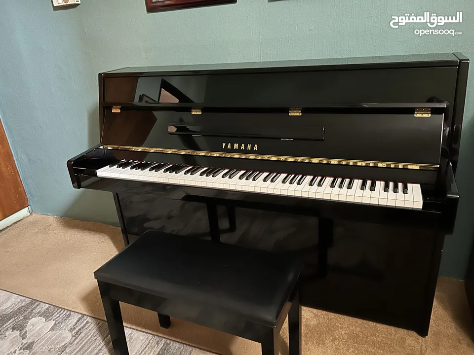 Single hand sparingly used YAMAHA Upright Piano (Model:LU-90) & Piano Bench with storage for sale