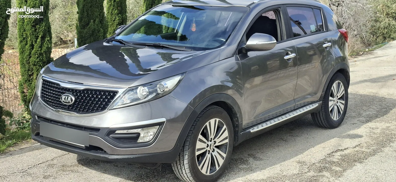 جيب كاياسبورتاج موديل 2014-اتومتيك'دفع 4×4 ماتور 2000ديزل فل فل اضافات ماعد الفتحة - نظيف من الاخر