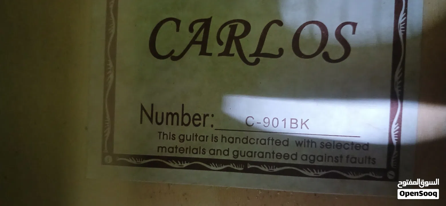 Carlos Guitar best new good condition less used