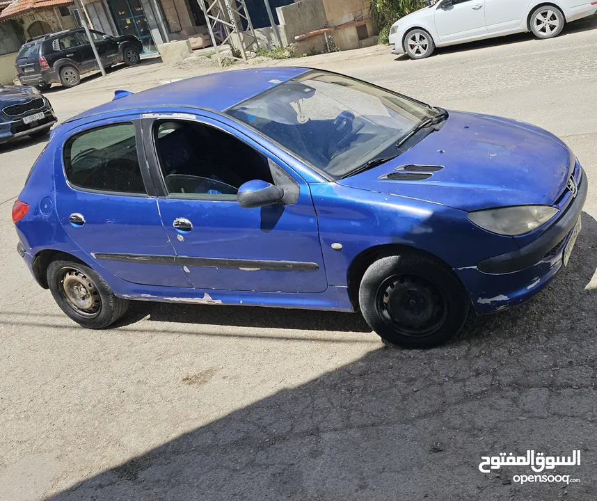 بيجو 206 ..2006 ..جير عادي ..بنزين  ماتور 1400