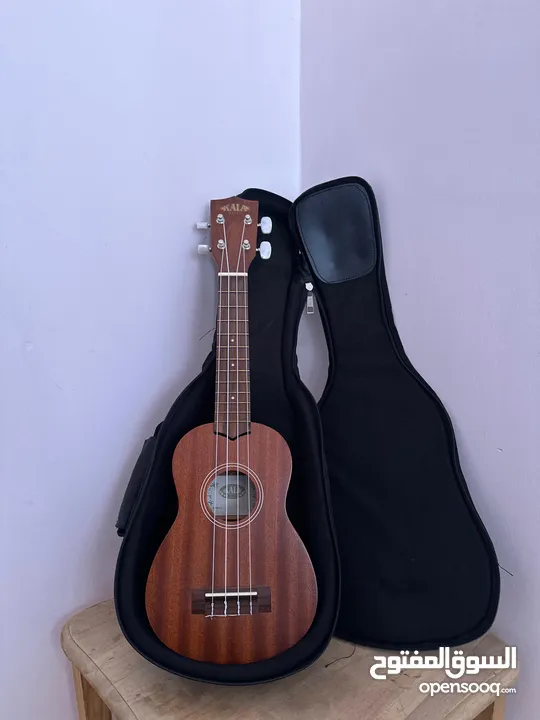 ukulele kala ka-15s يوكيليلي اصلي جديد مع الشنتة نوعية ممتازة جدا اوتار اصلية جديدة نوعية نضيفة