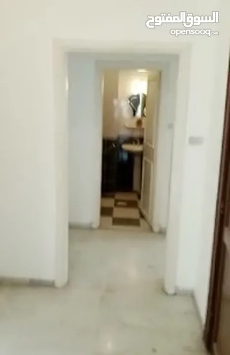 شقة طابقية للبيع في ام اذينة الشرقي - ref : 14475