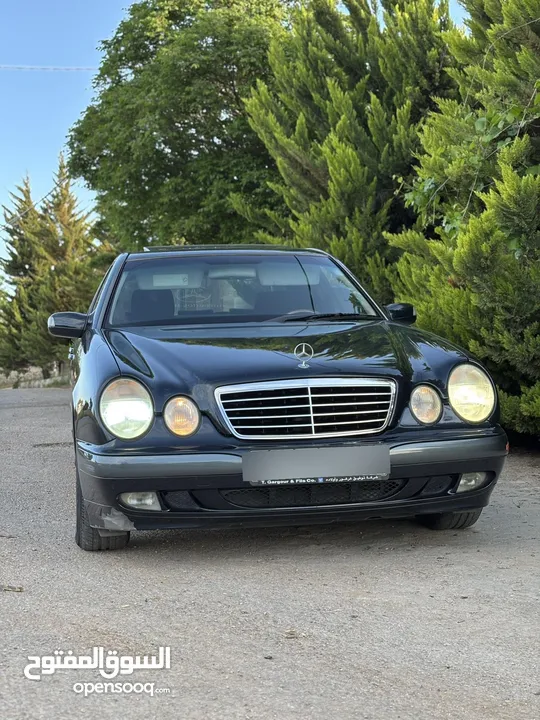 E200. 2002  قرش ونص 2002  رقم الهاتف بالوصف